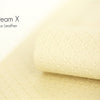 Cream X